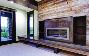 Contemporary fireplace by Todd Arenson Construction using Reclaimed Wyoming Snow Fence Wood with steel and concrete accents.